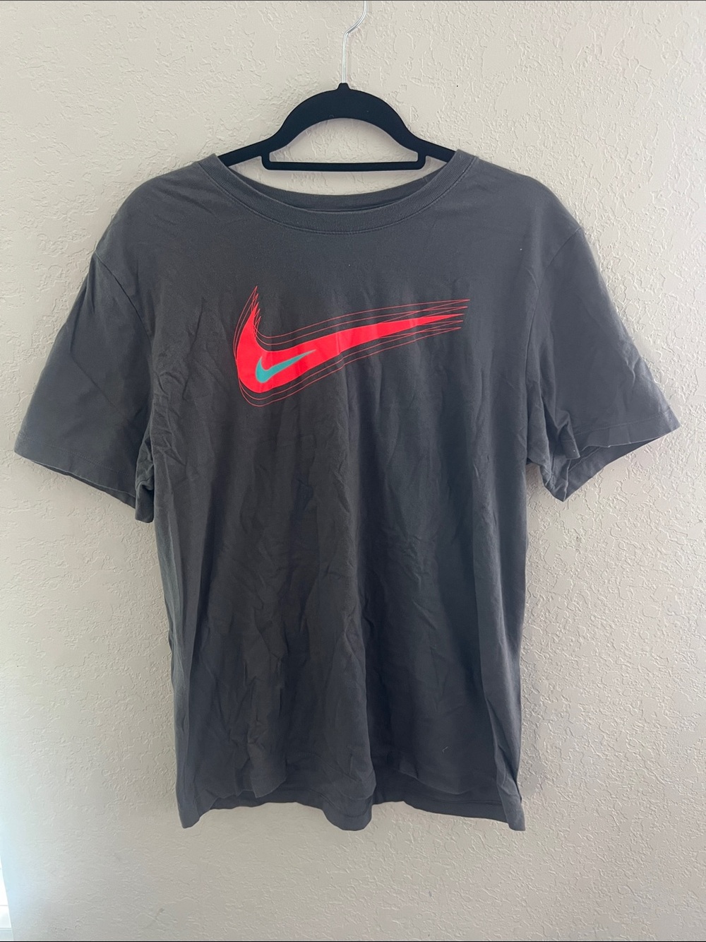 Nike Black Short-Sleeve Tee with Red and Teal Swoosh Accent